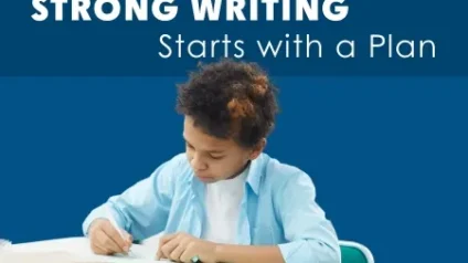 student writing at a desk